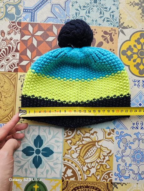 Čiapka s brmbolcom, 134