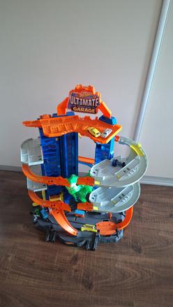 Hot wheels dráha garáž dinosaurus t-rex ultimate,