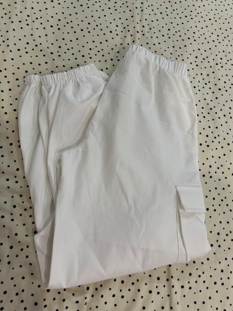 Biele širsie nohavice, 152