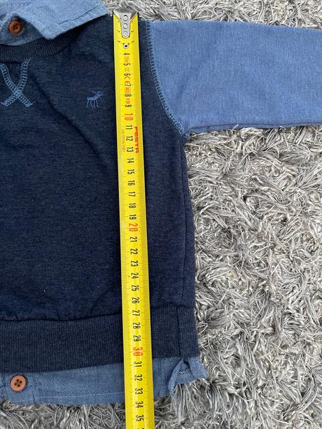 Mikina s falošnou košeľou, 86