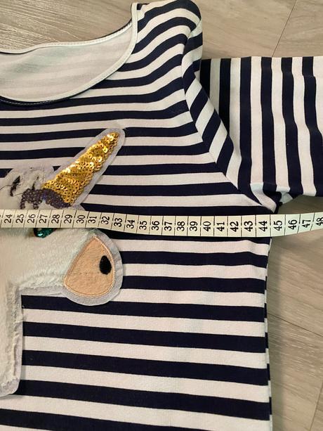 Šaty s jednorožcom, 164