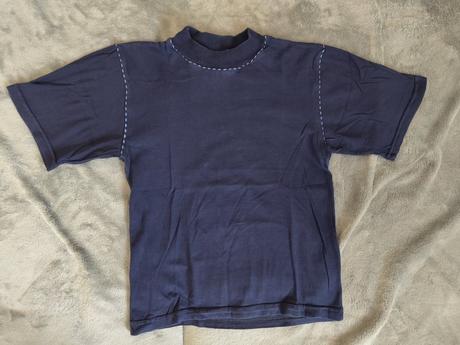 Tmavomodré tričko, 116