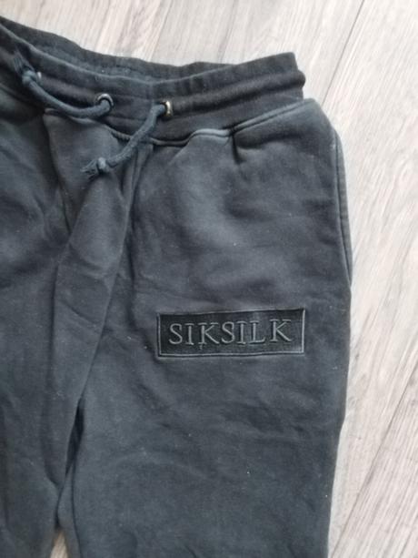 Tepláky zn. siksilk, xs