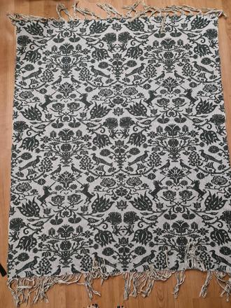 Obojstranný koberec,