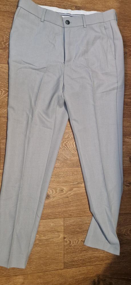 Krásne sviatočné nohavice v svetlo sivej farbe, 170