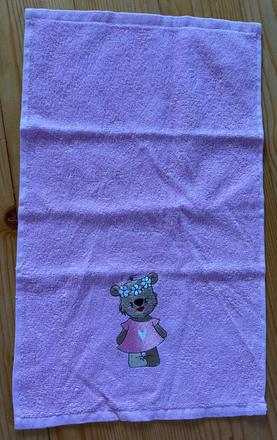 Nepouzity ruzovy uteracik s mackom, 