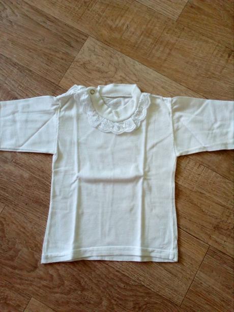 Kojenecka kosielka, 56