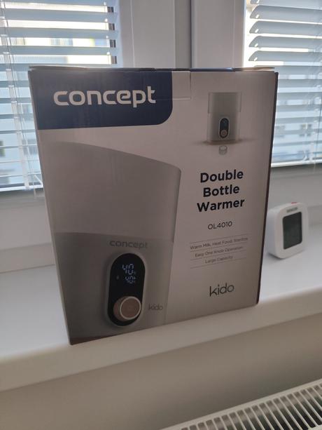 Ohrievačka mlieka a príkrmov concept, 