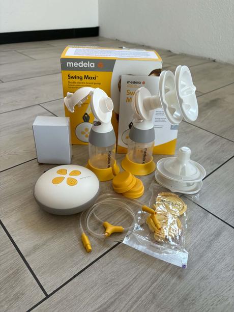 Predám elektrickú odsávačku mlieka medela swing ma,
