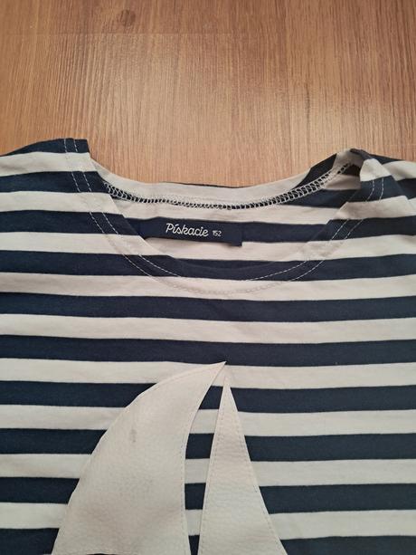 Piskacie tričko, 152