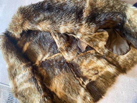 Kozusinova vesta per una, s