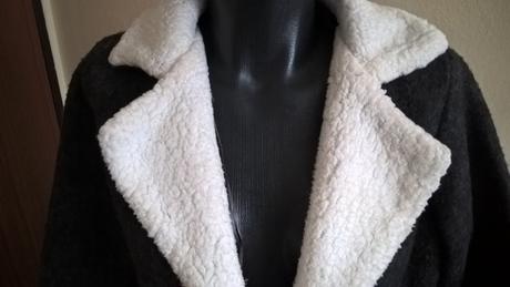 Prechodný kabát, 42