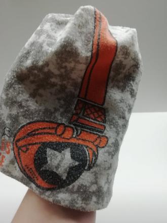 Štýlová čiapka, 74