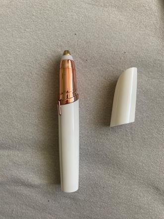 Elektrický zastrihávač chĺpkov,