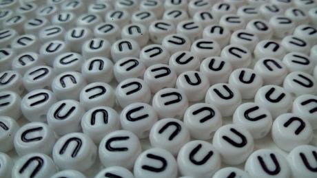 Písmenka lentilkové u,