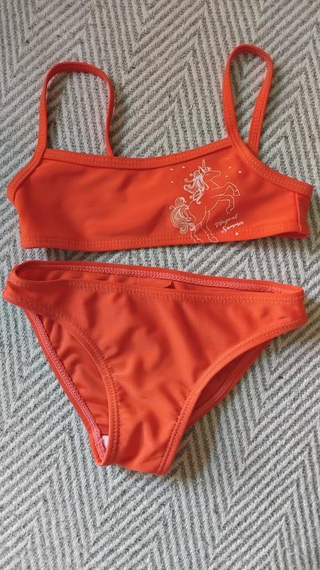 Plavky s jednorozcom, in extenso,98