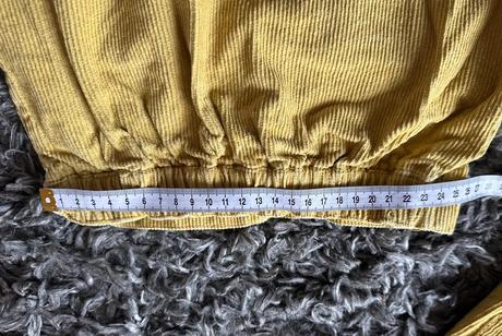 Menčestrová sukňa, 116