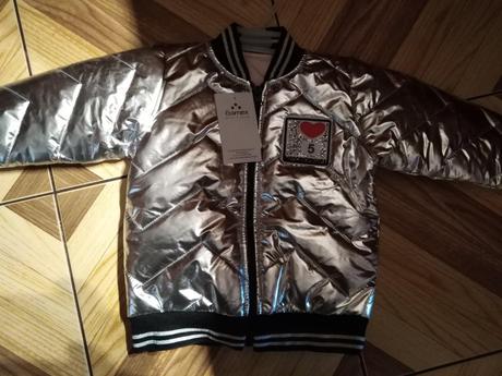 Strieborna bundička, 92