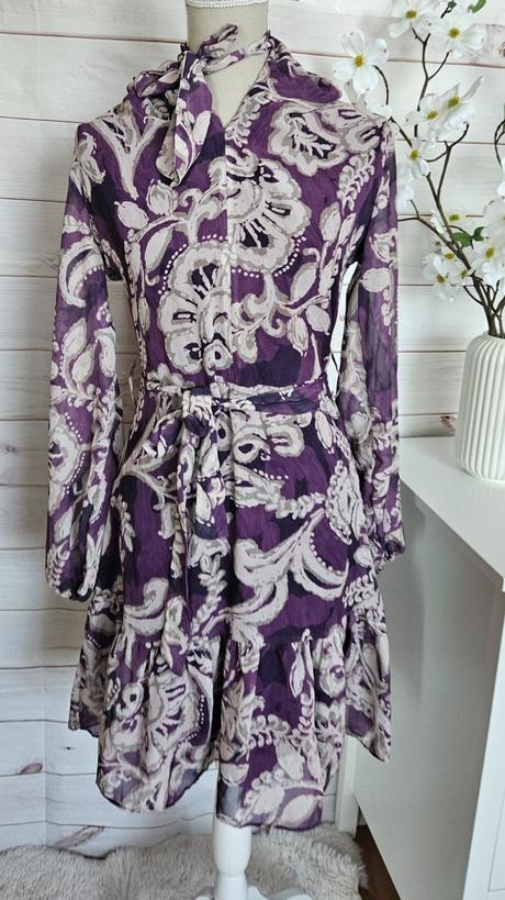 Krásne lahulinké šaty, 38