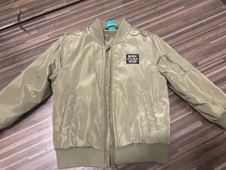 Prechodná kaki bunda, 104