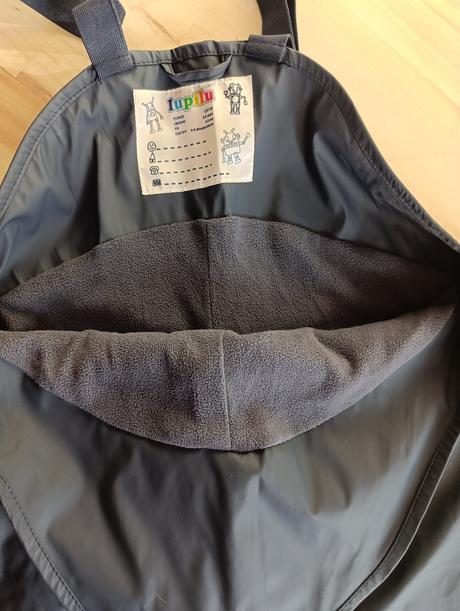 Nohavice do dažďa, lupilu,122