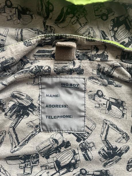 Tenka zelenkasta bunda s kapucnou,