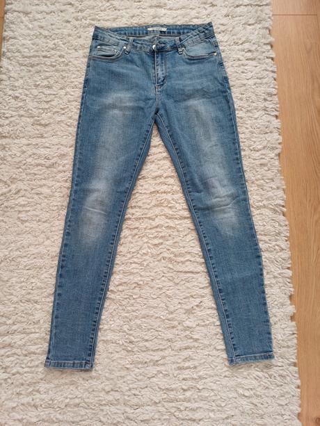 Dámske rifle bledomodrej farby, 28