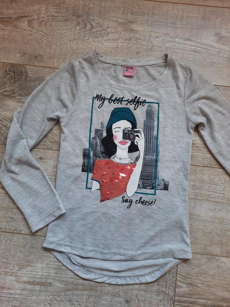 Tenký pulovrik, 128