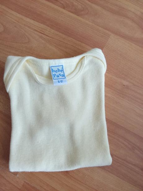 Kojenecké tričko, 74