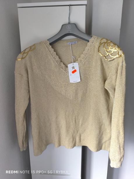 Zlatý svetrík, 42 / l