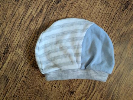 Prechodná čiapka, 56