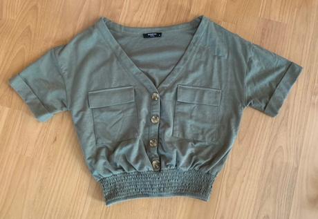 Khaki top, reserved,m