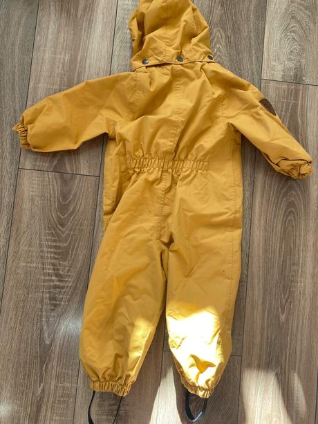 Kombinéza do dažďa, 92