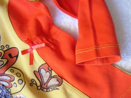 Oranžovo-žltý rolák veľ. 104-110, 104