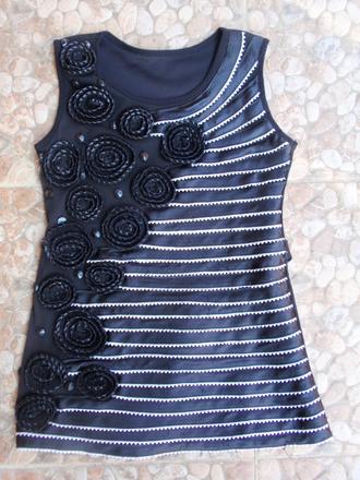 Čierny sviatočný top, 122