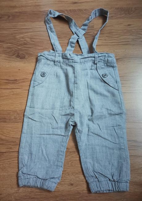 Nohavice s trakmi, 74