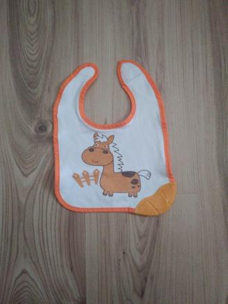 Podbradník alebo slintáčik s hryzátkom,