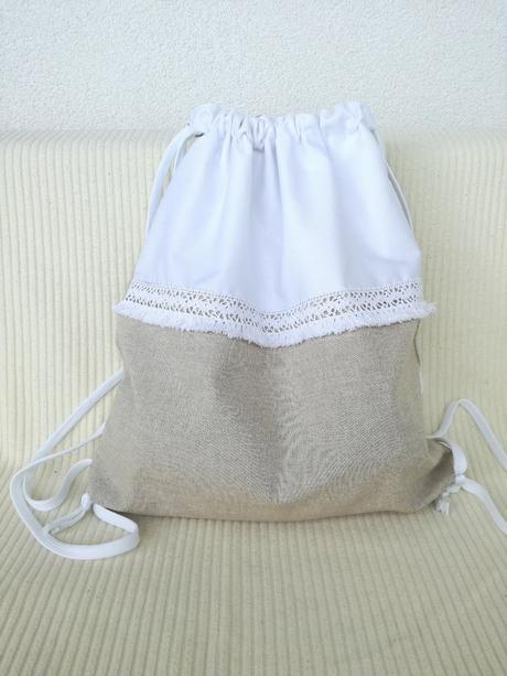 Textilný šnúrkový batoh s podšívkou a vreckami,