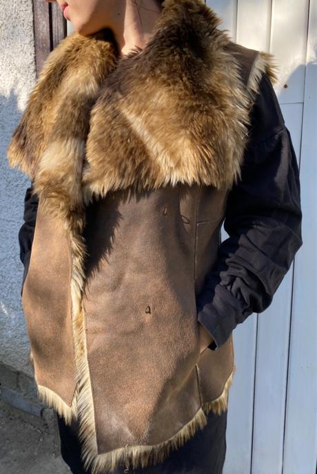 Kozusinova vesta per una, s