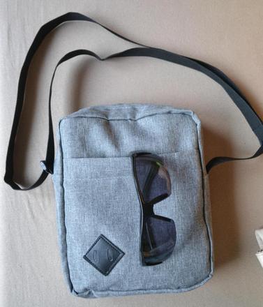 Pánska alebo unisex taštička posuvný trak,