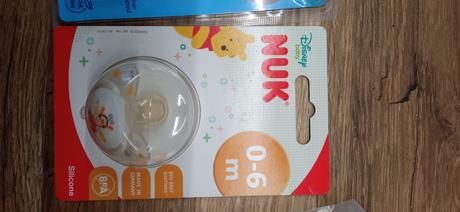 Mix potrieb pre bábätko (cumlík, držiak, krém ), nuk