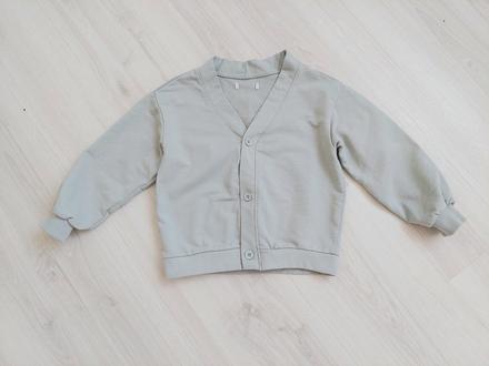 Bledozelený kardigan, 104