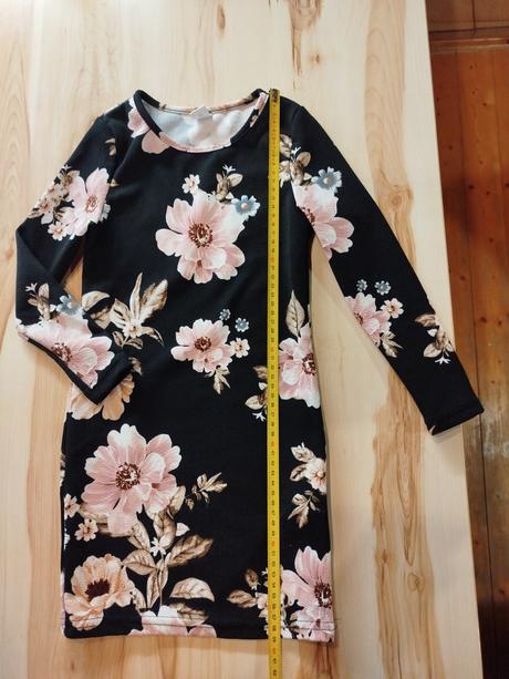 Kvetinové šaty, 122