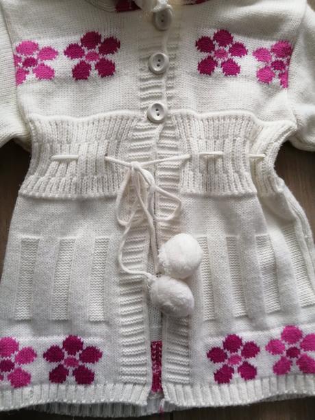 Svetrík s brmbolcami, 98