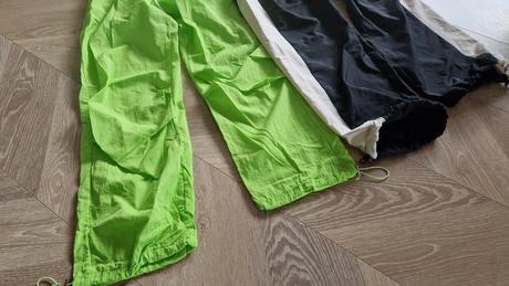 Šuštiakové tepláky, 164