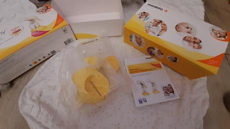Odsávačka medela, spací vak, podložka babymoov,