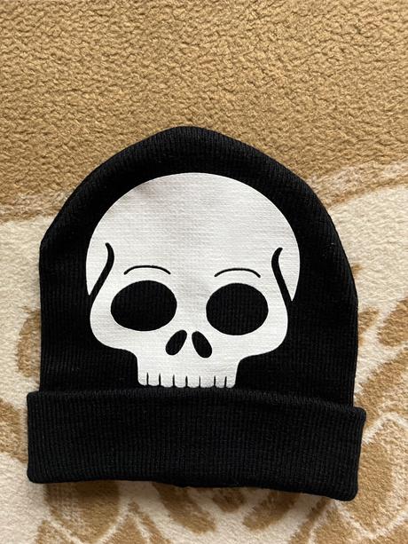 Čiapka s lebkou, 56