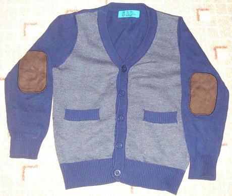 Modrý sviatočný sveter, 122