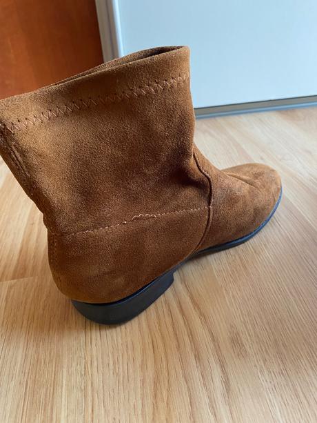 Kotnikove čižmy, 31