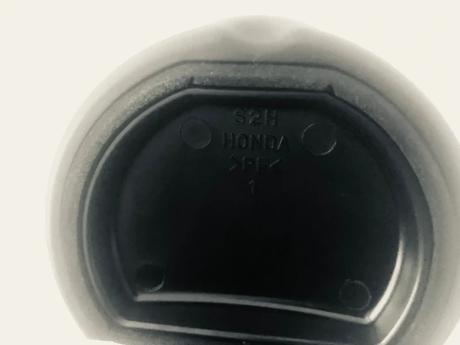 Nový nepoužívaný autopopolník/držiak honda, 